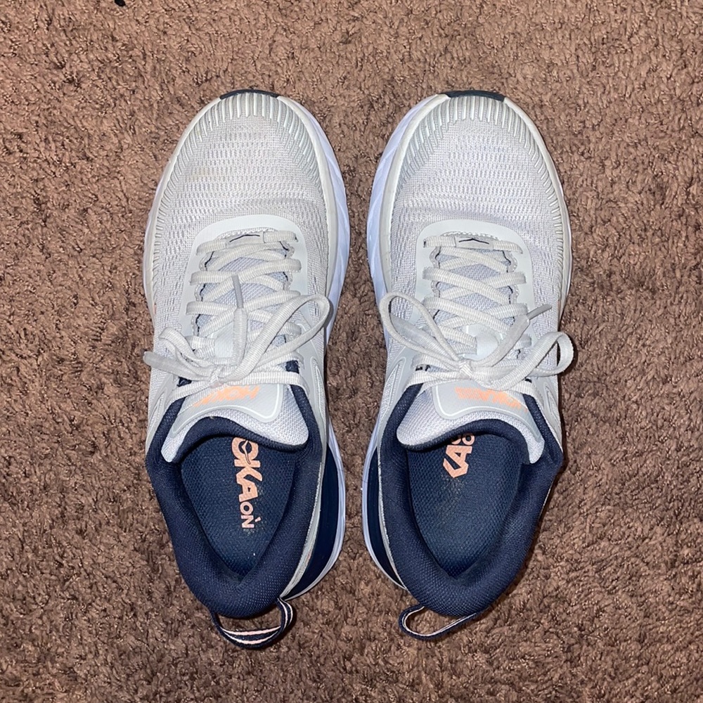 Grey HOKA sneakers